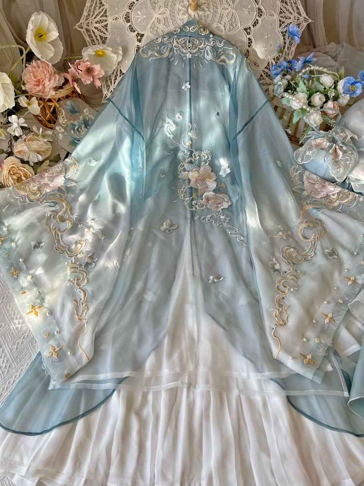 唐時代の時代を超越したエレガンス: 唐時代をイメージした刺繍と河子スカートを備えたオリジナルの漢服