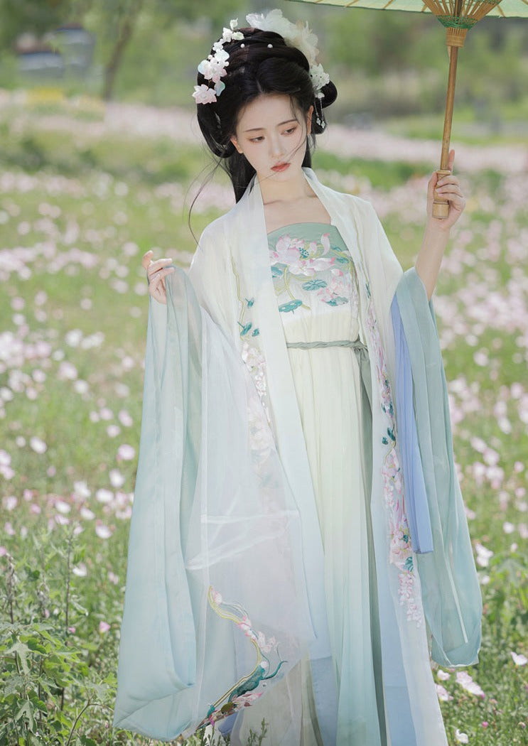 オリジナルの唐代漢服アンサンブル 4 点: 絶妙な和子スカートとワイド スリーブ シャツ - 春と夏向けの伝統的な漢の要素を使用して複雑に作られています。