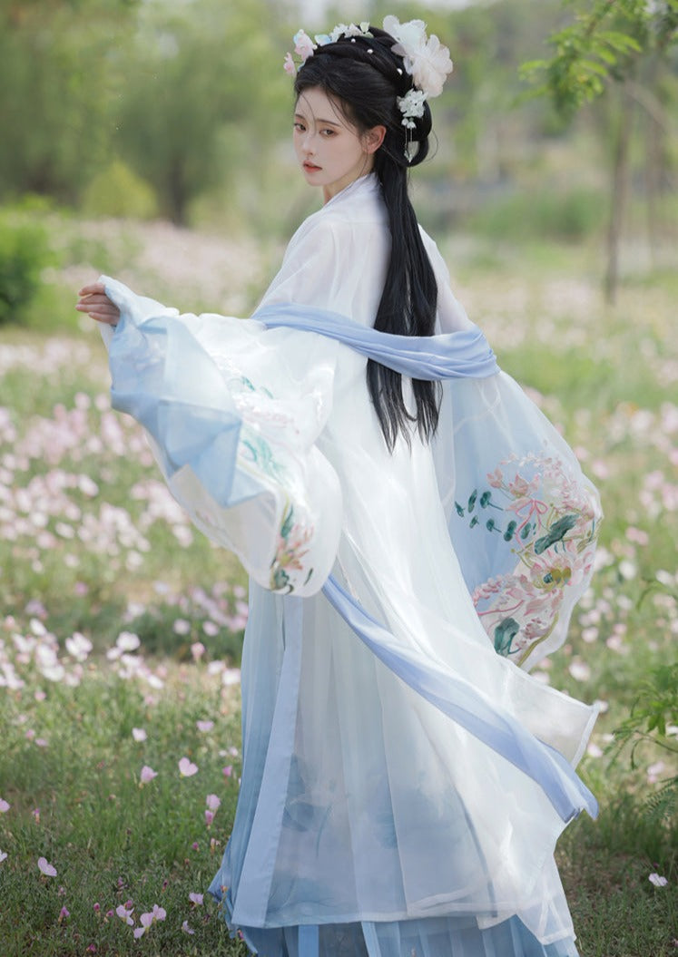 オリジナルの唐代漢服アンサンブル 4 点: 絶妙な和子スカートとワイド スリーブ シャツ - 春と夏向けの伝統的な漢の要素を使用して複雑に作られています。