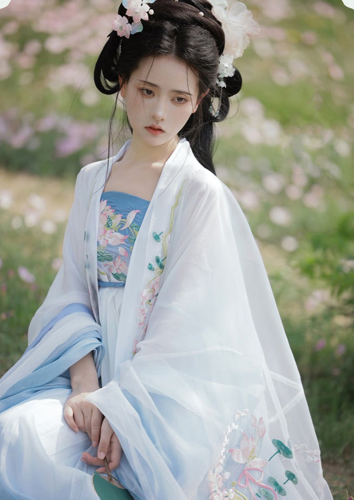 オリジナルの唐代漢服アンサンブル 4 点: 絶妙な和子スカートとワイド スリーブ シャツ - 春と夏向けの伝統的な漢の要素を使用して複雑に作られています。