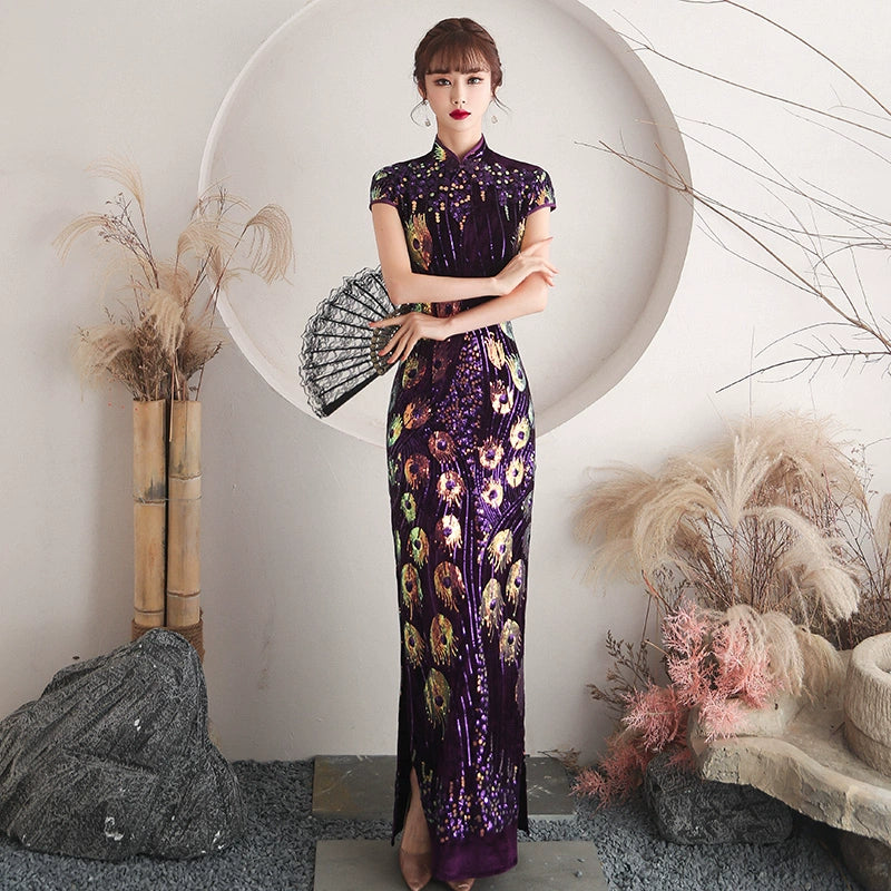 Floral pattern long jacquard silk-satin cheongsam dress inspired by traditional designs. Available in green, purple, and blue colors, plus sizes, and featuring high slits and sleeveless options. Perfect for any occasion. Buy vintage, sexy, or modern cheongsam dresses with sewing patterns from our collection.