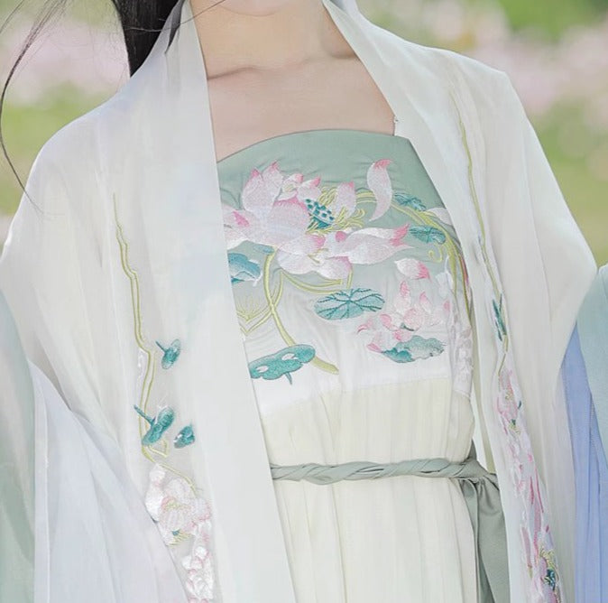 オリジナルの唐代漢服アンサンブル 4 点: 絶妙な和子スカートとワイド スリーブ シャツ - 春と夏向けの伝統的な漢の要素を使用して複雑に作られています。