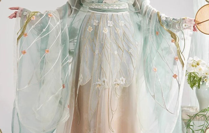 6 ピースのオリジナル漢服: 南北朝時代にインスピレーションを得た、特大の袖とウエストバンドを備えたアンサンブル。春に向けた複雑な刺繍が特徴です。