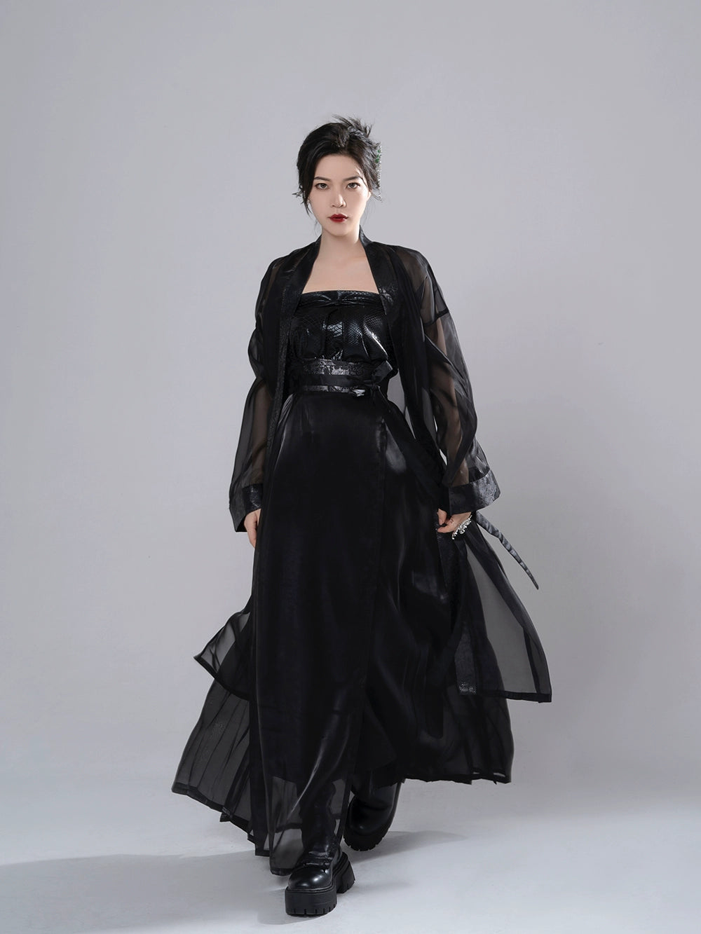 Embrace timeless style with our Song Dynasty-inspired Summer Hanfu ensemble in sleek black. Explore our collection of black Hanfu attire, including dresses, tops, and skirts, designed for modern comfort and traditional elegance. Elevate your wardrobe with our versatile Hanfu pieces, perfect for any occasion. Discover the beauty of Hanfu fashion and make a statement with our captivating black ensemble.