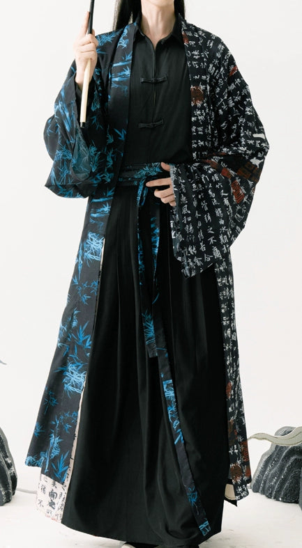 Experience the elegance of the Song Dynasty with our Calligraphy Hanfu Men's Cloak Large Sleeve Shirt Black Suit. Inspired by Chinese calligraphy and cultural aesthetics, each piece embodies timeless sophistication. Elevate your wardrobe with our fusion of classic and contemporary Hanfu styles.