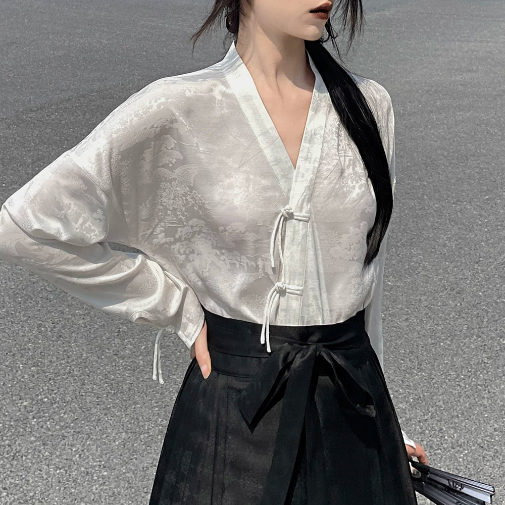 Explore modern elegance with our Black & White Shirt Women's Horse Face Skirt Suit. This ensemble blends traditional Hanfu design with contemporary flair, featuring intricate embroidery and authentic details. Embrace the timeless beauty of Hanfu fashion and make a statement with your unique style.