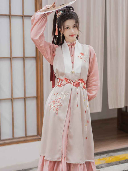 Pink modern Hanfu dress featuring a stylish and elegant design with intricate embroidery and traditional Chinese accents. Perfect for special events or cultural celebrations. Exudes sophistication and femininity in a contemporary take on traditional Hanfu attire.